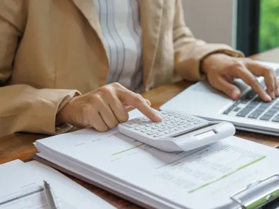 someone using a calculator