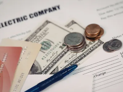 spare change over an electric bill