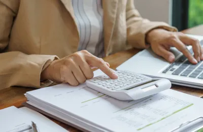 someone using a calculator